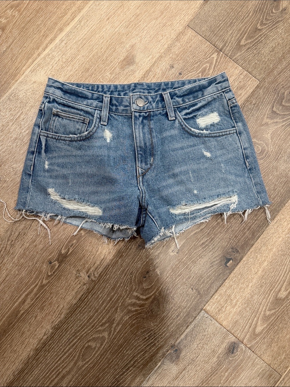 Lovers + Friends Distressed Light Blue Denim Cutoff Shorts